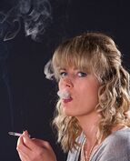 House Wife Showing Off Her Smoke Tricks Smoking Fetish Model